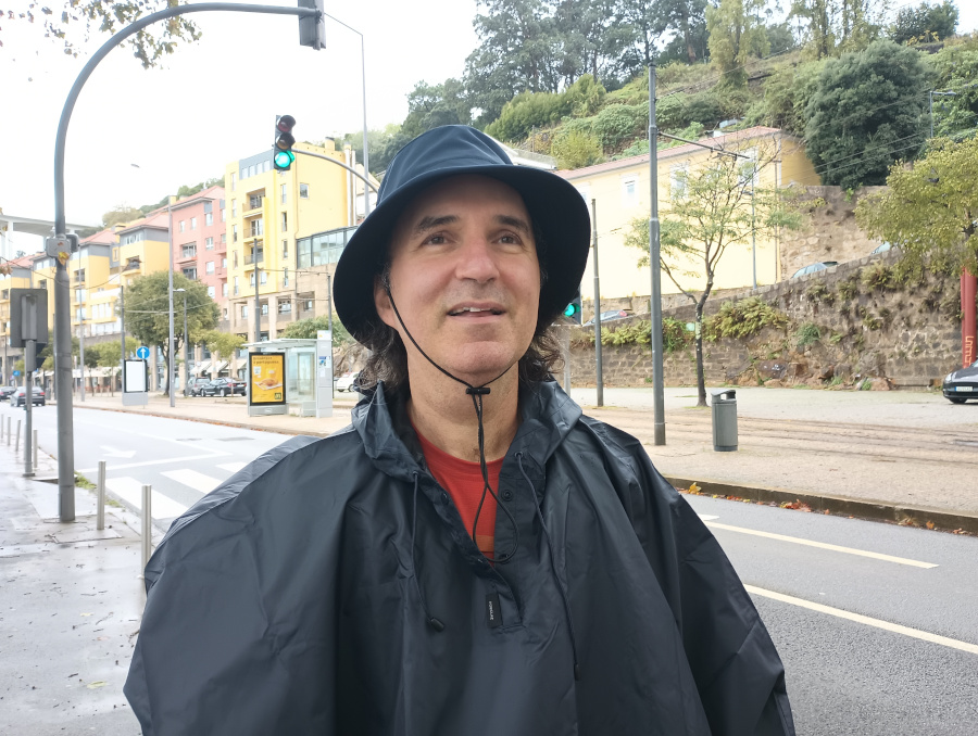 Man wearing a rain poncho.