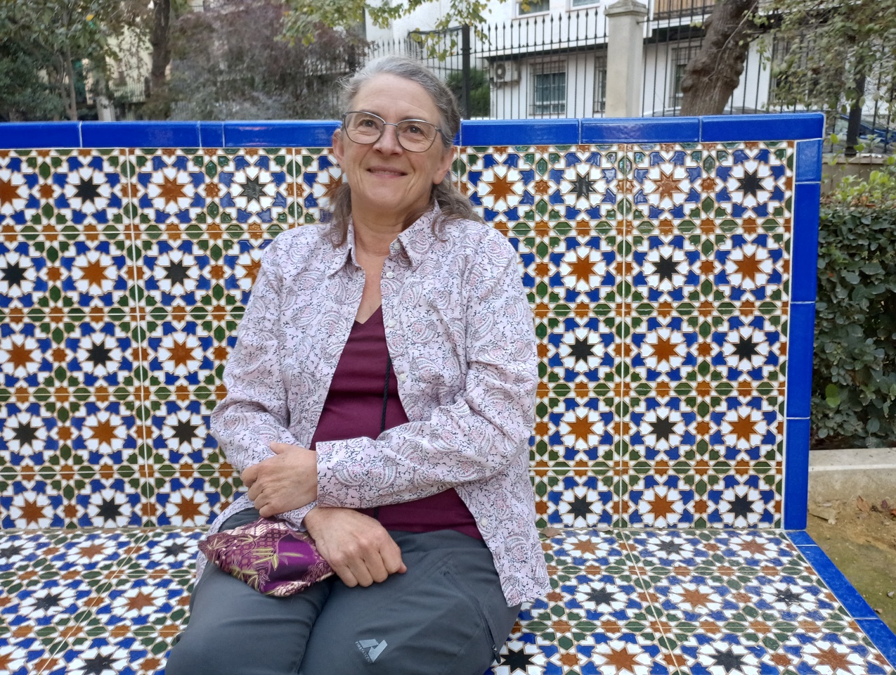 Roseamry on tiled bench.