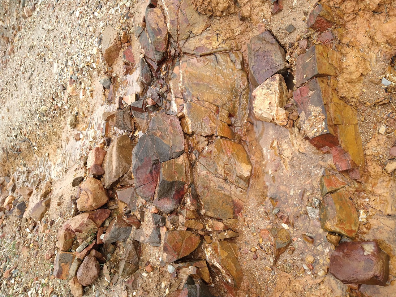 Red rock with high iron content.